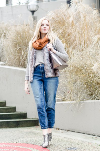 Denim jacket with a green scarf and short blue jeans