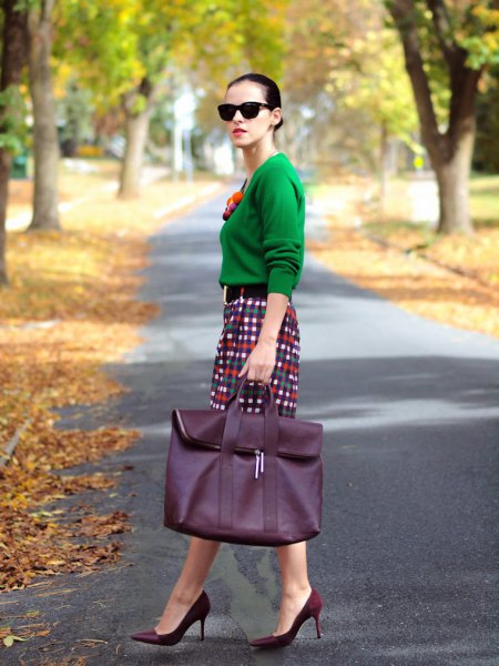 Emerald green sweater with checked pencil skirt