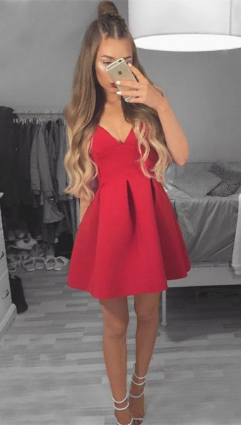 Red fit and flare mini dress with white strappy open toe heels