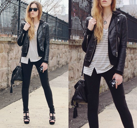 Tailored motorcycle jacket with a gray and white striped V-neck top and skinny jeans