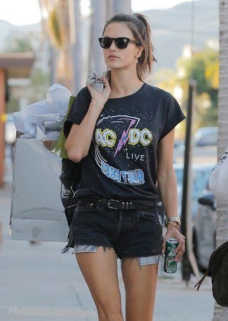 Graphic tee with belted black ripped denim shorts