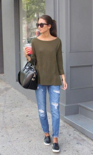 Green long sleeve t-shirt with a boat neck and ripped slim fit jeans