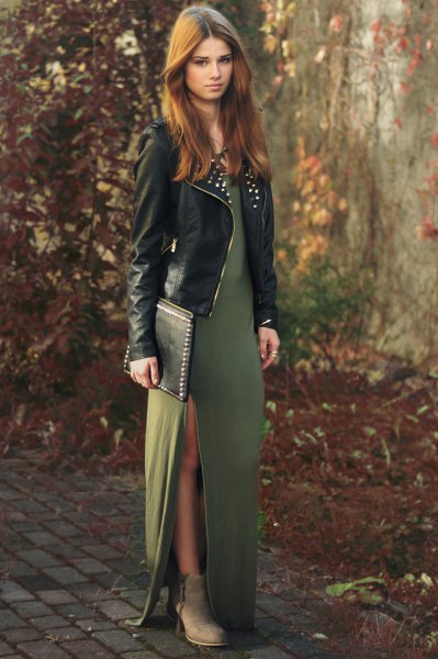 Green maxi dress with side slit and leather jacket