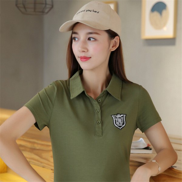 Green slim fitting embroidered polo shirt with light pink baseball cap
