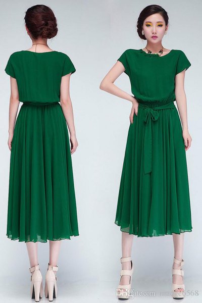Green pleated chiffon midi dress with a tie belt at the waist