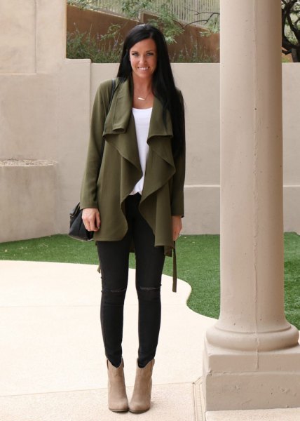 Green waterfall chiffon cardigan worn with black skinny jeans and camel suede boots