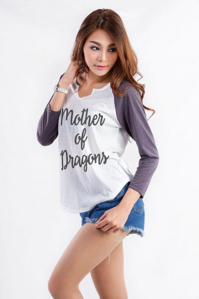 Gray and white baseball style graphic long sleeve tee with blue denim shorts