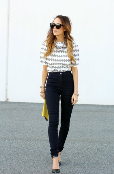 Gray and white printed half sleeve blouse and high waisted black jeans