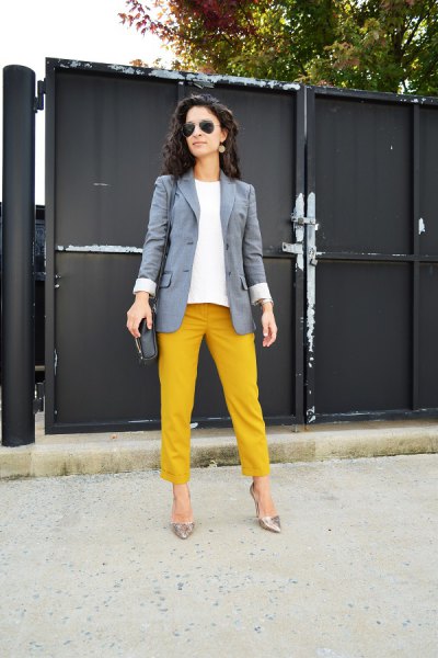 gray blazer with straight cuffed yellow trousers