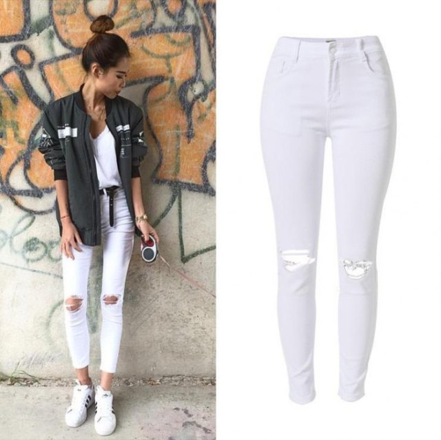 Gray bomber jacket paired with high waist cropped ripped white skinny jeans