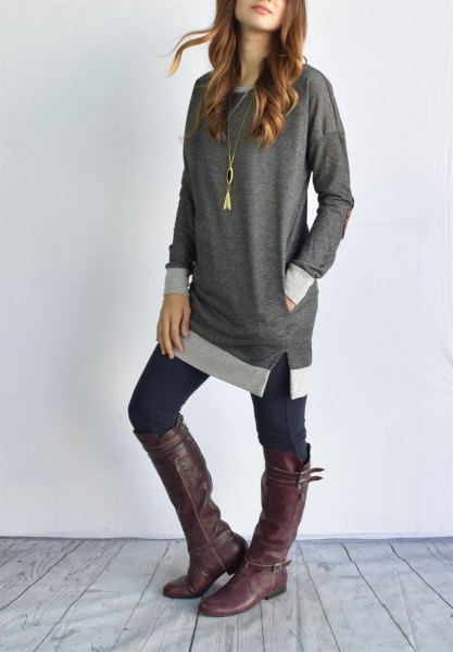 Gray colorblock tunic top with dark skinny jeans and knee high leather boots