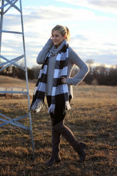 Gray turtleneck sweater with checked fringed scarf