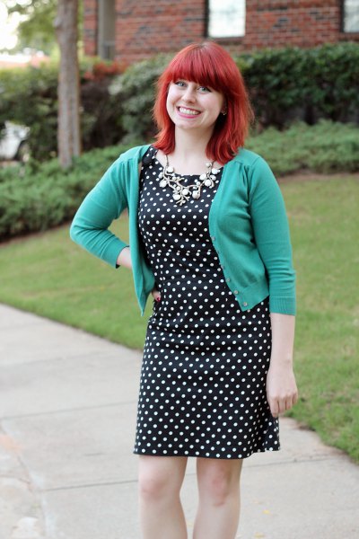 gray short cardigan with black and white polka dot dress