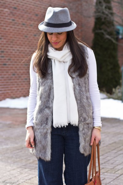 gray faux fur vest with white long sleeve t-shirt and matching scarf