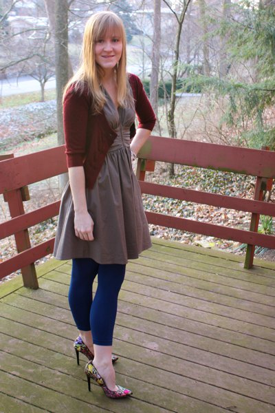 gray flared knee length dress with dark blue footless tights