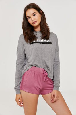 Gray graphic sweatshirt with pink high waisted sweat shorts
