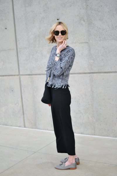 gray cardigan with black wide leg trousers and suede loafers