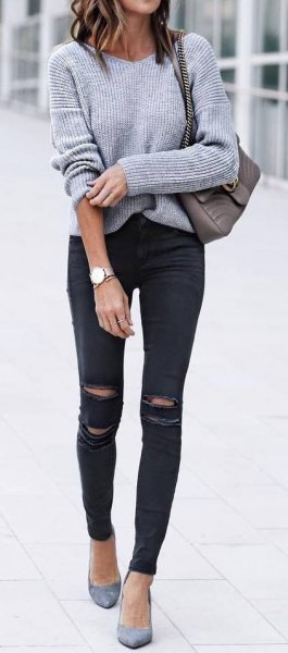 Pair a gray cable sweater with black ripped skinny jeans