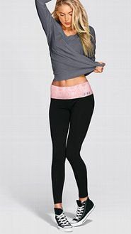 gray long sleeve t-shirt with black leggings and high heeled canvas shoes