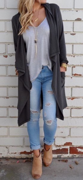 Gray long cardigan with light blue ripped skinny jeans