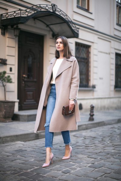 gray, long winter wool coat with blue, slim-fitting, short jeans