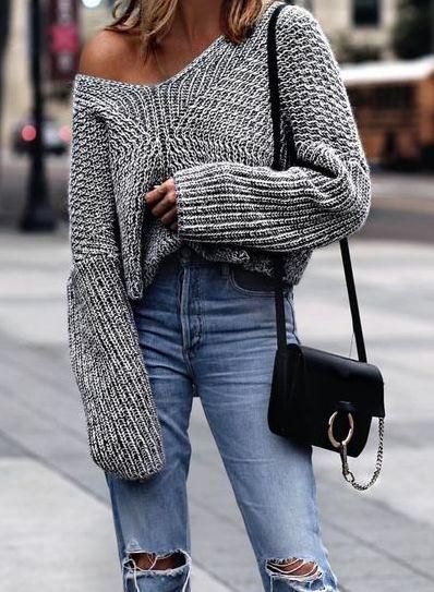 Oversized gray one shoulder knitted sweater with ripped boyfriend jeans