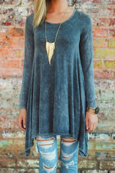 Gray tunic top with peplum and ripped skinny jeans