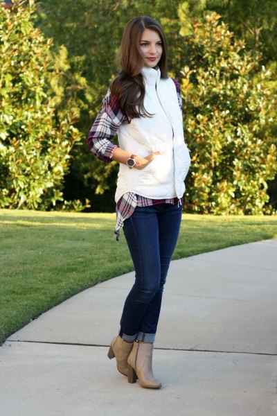 a gray checked boyfriend shirt and light pink leather ankle
boots