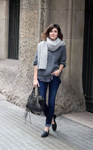 Gray ribbed chunky knit sweater with scarf and black penny loafers