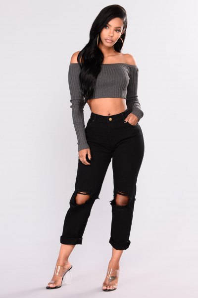 Gray off shoulder ribbed sweater styled with black ripped boyfriend jeans