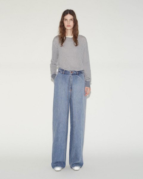 gray ribbed sweater with light blue wide leg pleated jeans