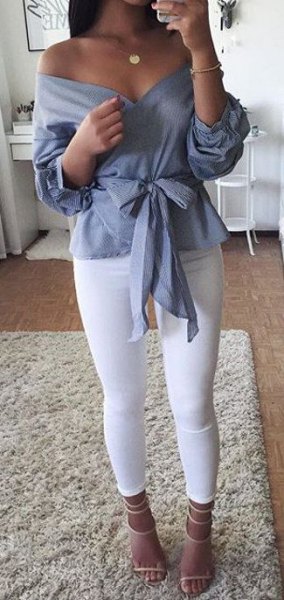 Off shoulder blouse with gray tie at front, leggings and open heels