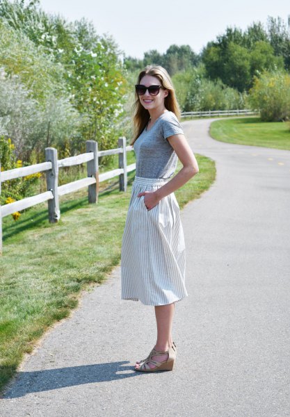 Gray short sleeve t-shirt with vertical striped flared midi skirt