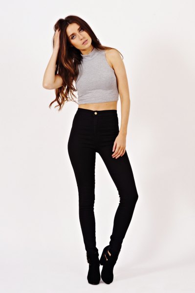 Gray sleeveless crop top paired with high waist black skinny
jeans