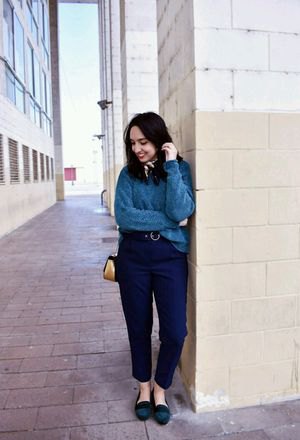 gray sweater with dark blue ankle pants