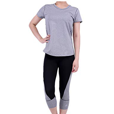 gray t-shirt with black short leggings and white sneakers