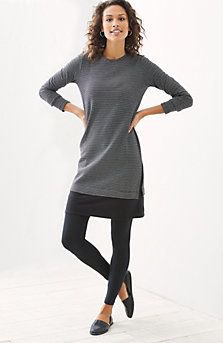 gray long-sleeved tunic top with black leggings and leather low shoes