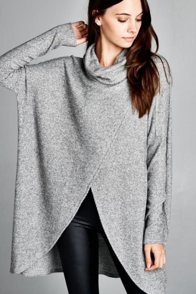 Gray turtleneck tunic sweater and black tight leggings