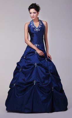 Dark royal blue, floor-length dress with a halter neck and a flared cut