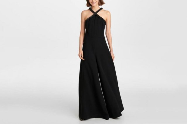 Black halterneck formal jumpsuit with a flared silhouette
