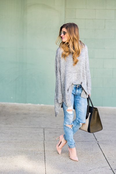 Heather gray oversized sweater with boyfriend jeans and pink heels