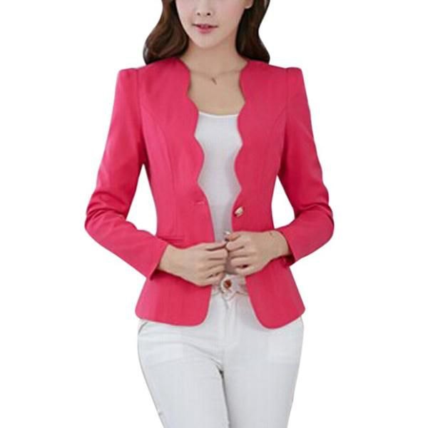 Pink slim-fit blazer with scalloped edges and white skinny trousers