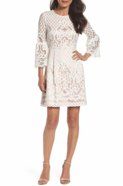 Ivory flared mini dress with bell sleeves