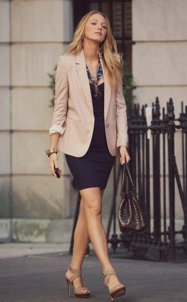 Khaki blazer with black fitted mini skirt
