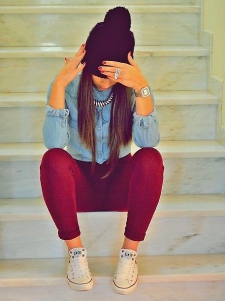 Light blue button down chambray shirt and burgundy super skinny
jeans