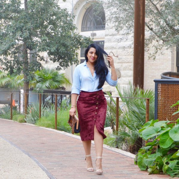 Light blue button down shirt and burgundy velvet skirt with button down front