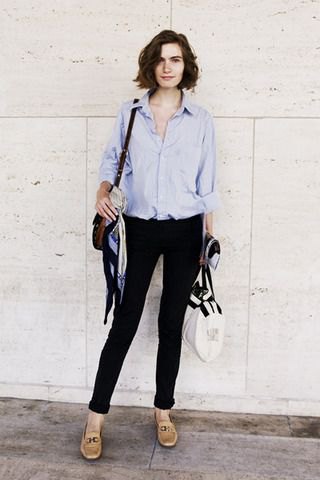 Light blue button down shirt, black high waisted skinny jeans and leather loafers