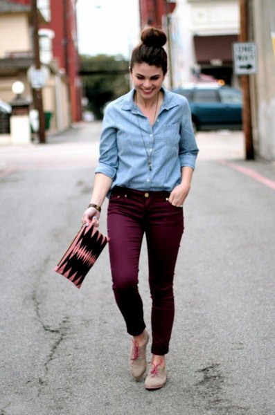 Light blue button down shirt and maroon slim fit jeans