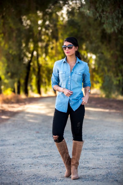 Light blue button down chambray shirt, black jeans and gray suede flat knee high boots