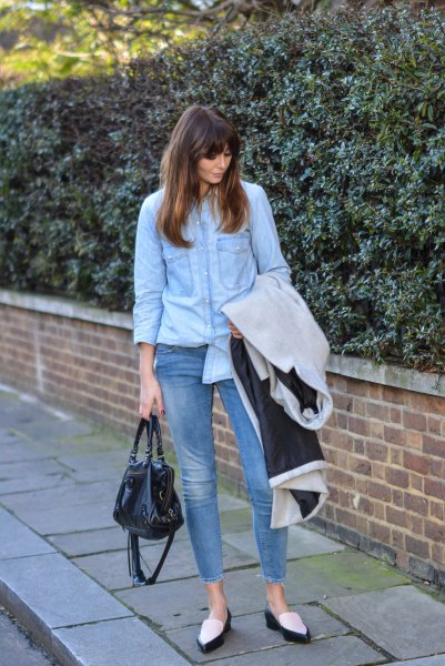 Light blue chambray shirt with cropped skinny jeans and black and white loafers